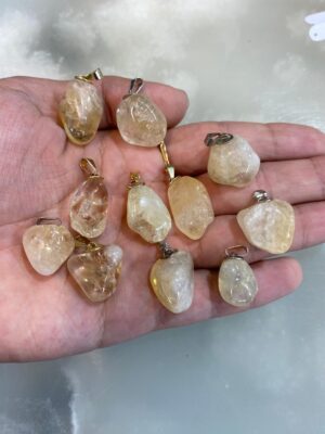 produto_146_1_img_8303-e3ce1400fb08056cca16987920694057-1024-1024-1.jpeg Pingente de Citrino Rolado