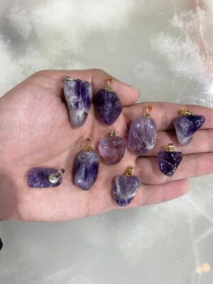 produto_150_1_img_8323-1b9ba65f25c1acfb5816988439135968-1024-1024-1.jpeg Pingente de Ametista Rolado